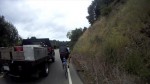 Truck passing cyclist small